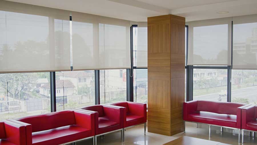 Smart home, motorized shades in Atlanta living room integrated with smart lighting - AVI Group